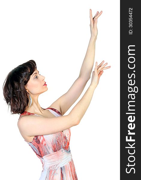 Portrait of a young attractive girl with the hands raised up on white background. Place for text design. Portrait of a young attractive girl with the hands raised up on white background. Place for text design.