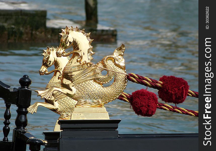 Venice - detail of berthed Gondola on the Canal Grande. Venice - detail of berthed Gondola on the Canal Grande