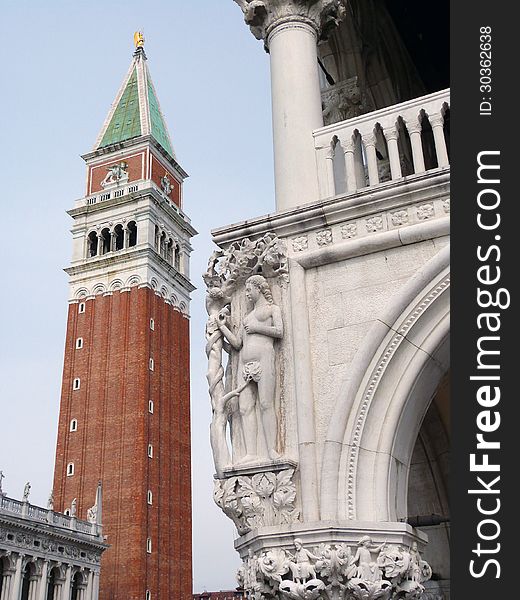 Venice - St Mark's Campanile and Doge's Palace with detail of sculpture of Adam and Eve in the Eden