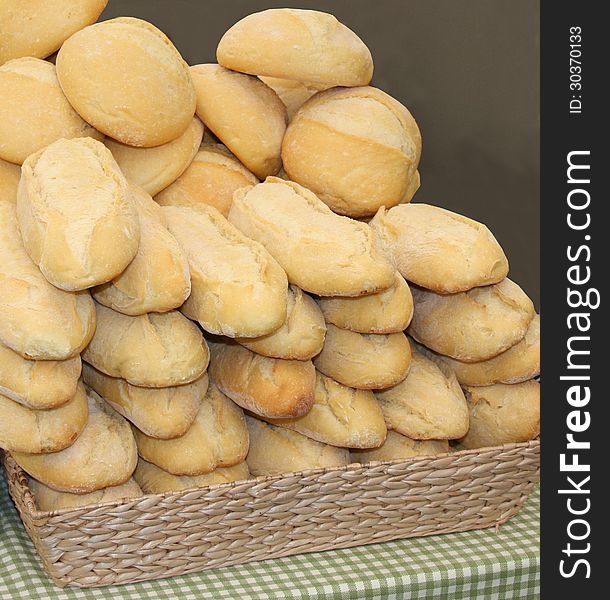 A Stack of Freshly Baked Crusty Bread Loaves.