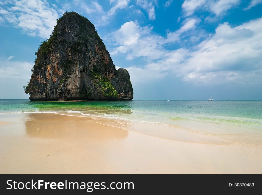 Tropical Beach Landscape With Rock Formation Island And Ocean