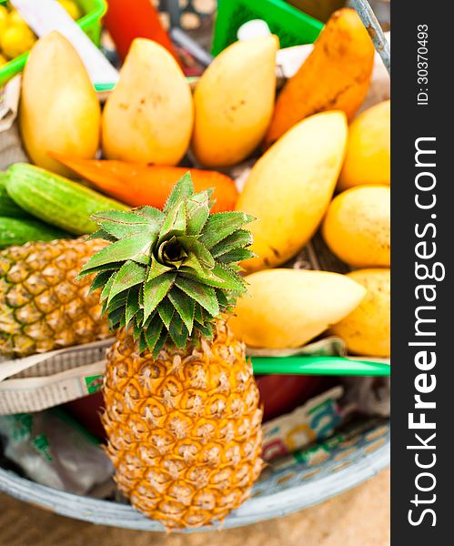 Selling Tropical Fruits And Vegetables At Market