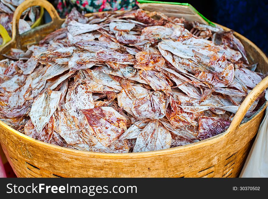 Sea food at market. Selling dry calamari in Thailand. Sea food at market. Selling dry calamari in Thailand