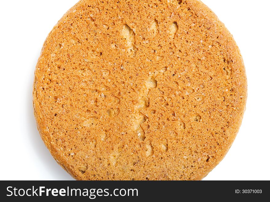 Round sweet oatmeal cookie. Macro background and texture