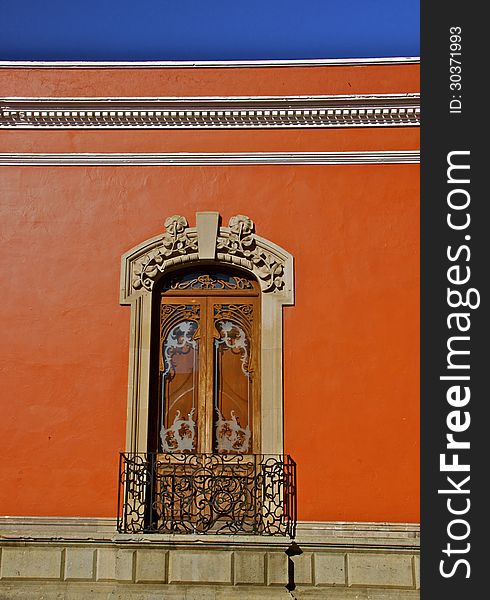 Detail of red mexican colonial house