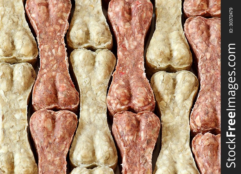 Dog snack bone food background. Dog snack bone food background