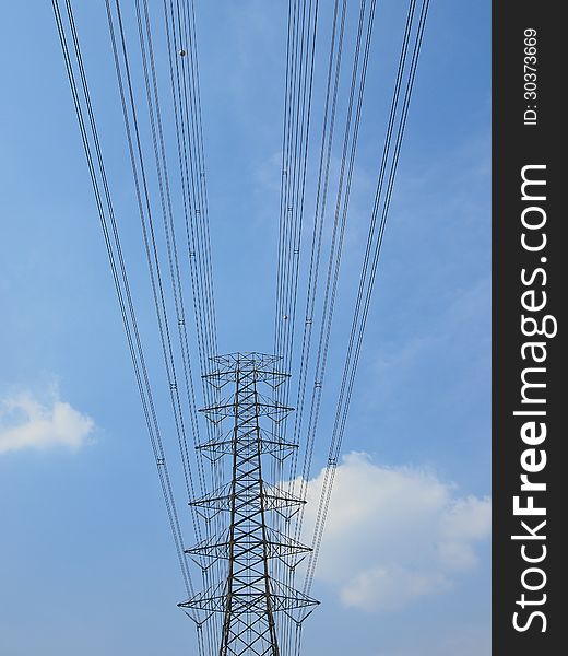 High voltage tower and cable line in sunny day. High voltage tower and cable line in sunny day