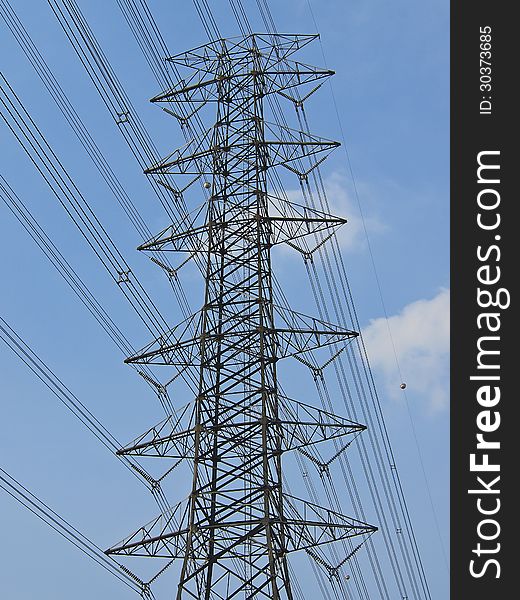 Perspective of high voltage tower in sunny day. Perspective of high voltage tower in sunny day