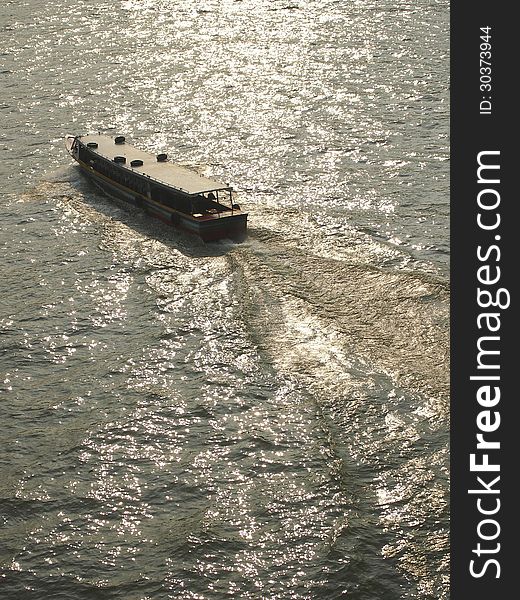 Passenger motorboat run fast speed in Chao Phraya river bangkok thailand. Passenger motorboat run fast speed in Chao Phraya river bangkok thailand