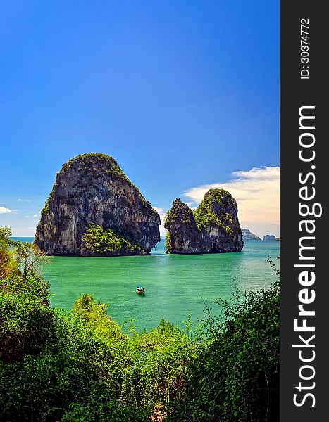 Tropical island and sea view with boat, Andaman sea, Krabi, Thailand. Tropical island and sea view with boat, Andaman sea, Krabi, Thailand