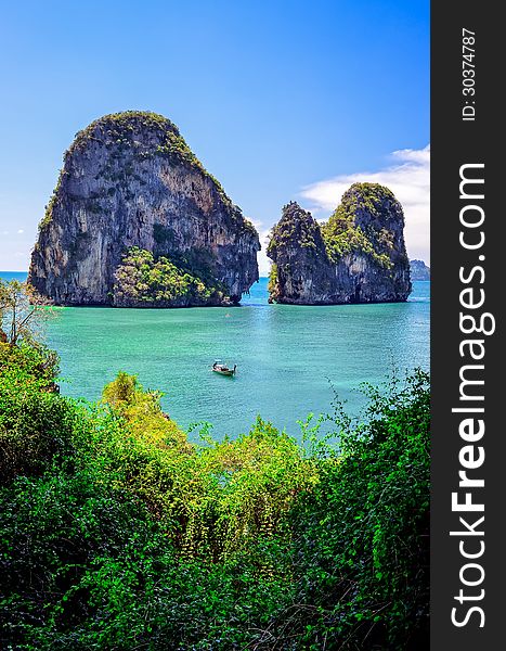 Tropical island and ocean view with boat, Andaman sea, Krabi, Thailand. Tropical island and ocean view with boat, Andaman sea, Krabi, Thailand