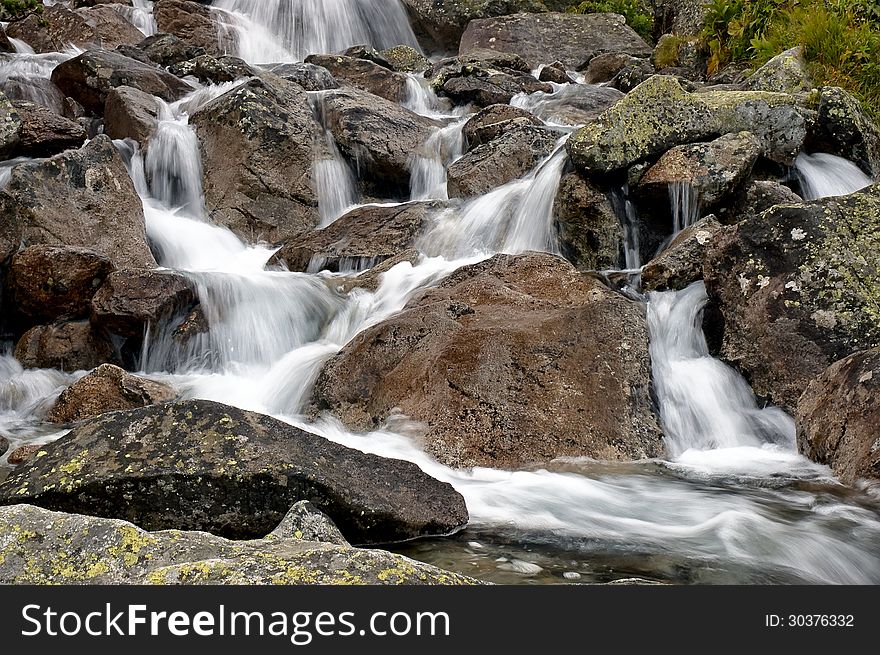 Wild mountain brook with stones. Wild mountain brook with stones