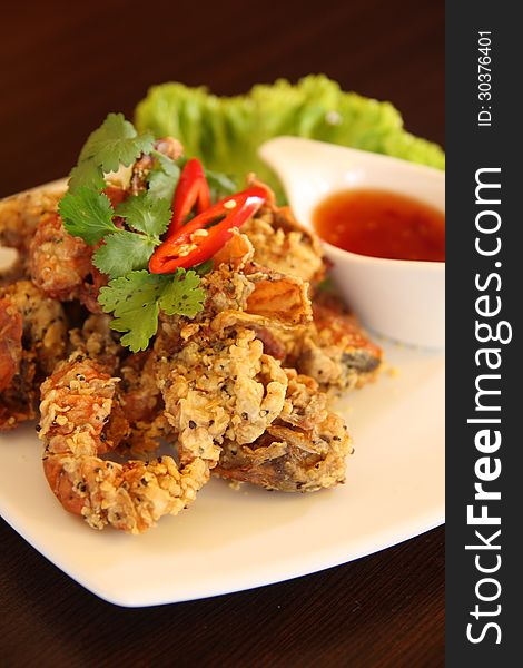 Deep fried soft shell crab in Thai style with garlic and pepper. Deep fried soft shell crab in Thai style with garlic and pepper