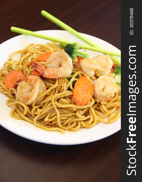 Stir fried hokkien noodles with oyster sauce and seafood. Stir fried hokkien noodles with oyster sauce and seafood.