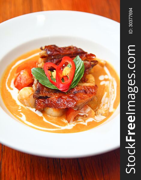 Delicious dish from Thai cuisine. Roast duck with red curry.
