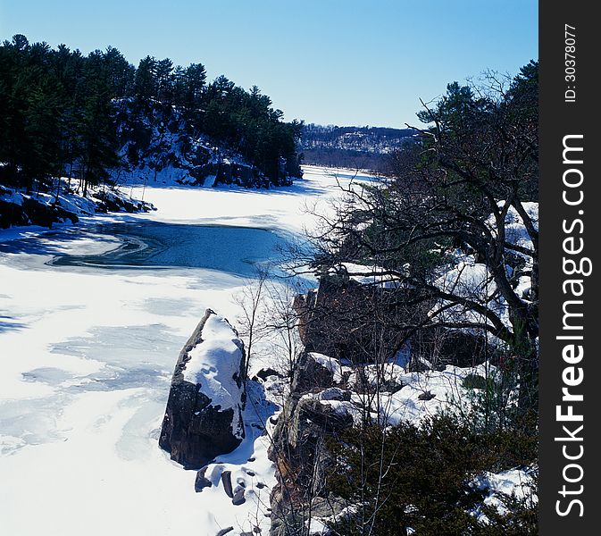 A late winter overlook on the scenic St. Croix River, at Interstate State Park in central Minnesota. A late winter overlook on the scenic St. Croix River, at Interstate State Park in central Minnesota.