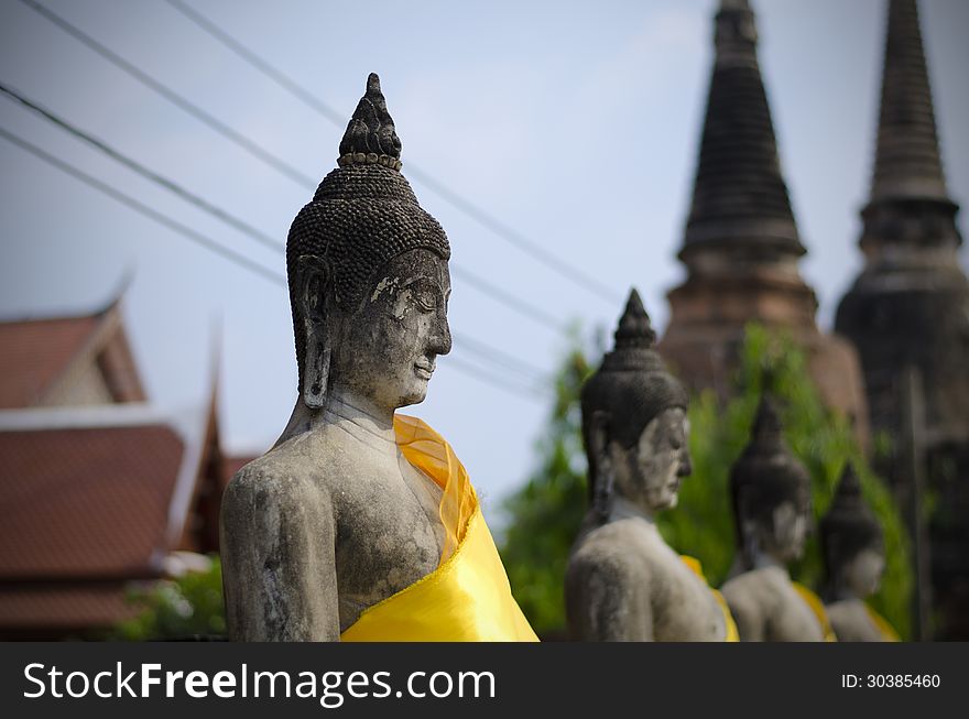 Ancient Buddha statues at Wat Yai Chai Mongkol in Ayutthaya, Thailand. Ancient Buddha statues at Wat Yai Chai Mongkol in Ayutthaya, Thailand