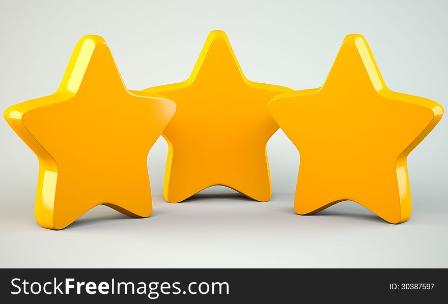 Three golden stars on grey background