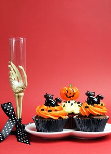 Halloween Party Food With Skeleton Hand Glass On Red Background - Vertical With Copyspace. Royalty Free Stock Images Halloween Party Food With Skeleton Hand Glass On Red Background - Vertical With Copyspace. Royalty Free Stock Images