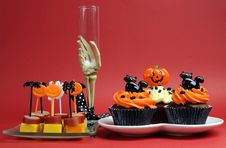 Halloween Party Food With Skeleton Hand Glass On Red Background. Royalty Free Stock Image Halloween Party Food With Skeleton Hand Glass On Red Background. Royalty Free Stock Image
