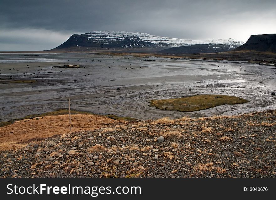 Icelandic landscape with lake and mountains