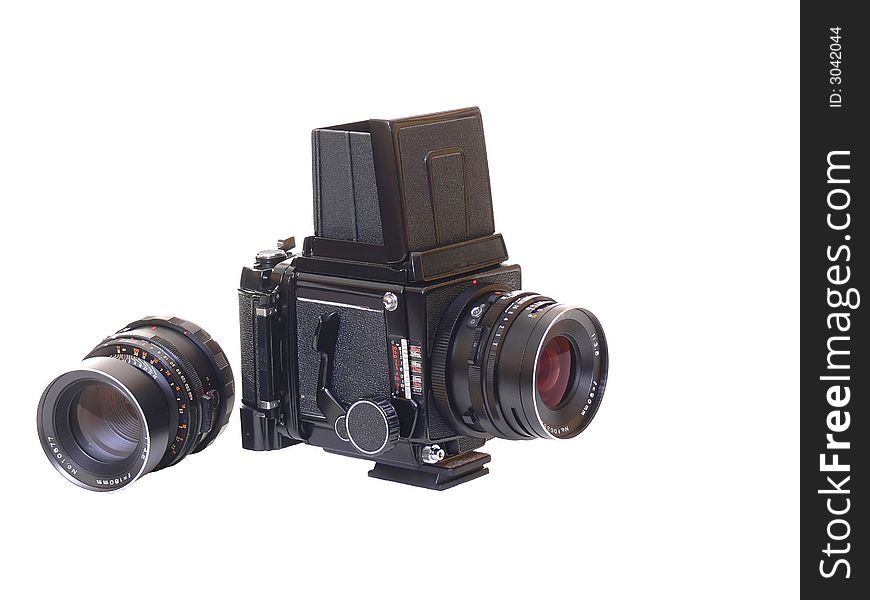 An vintage medium camera with an extra lens on white background. An vintage medium camera with an extra lens on white background.