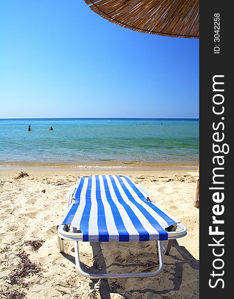 Beach with chair and umbrella in Greece. Beach with chair and umbrella in Greece