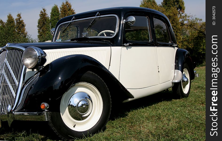 Old black and white citroen BL at the auto show. Old black and white citroen BL at the auto show