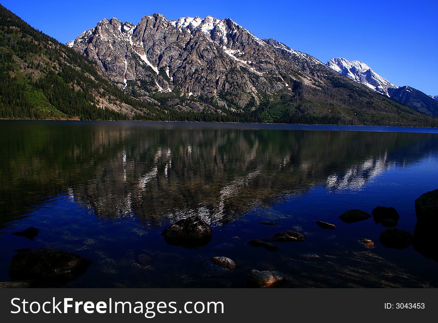 View of Tetons across Jenny Lake, Grand Teton National Park, Wyoming. View of Tetons across Jenny Lake, Grand Teton National Park, Wyoming