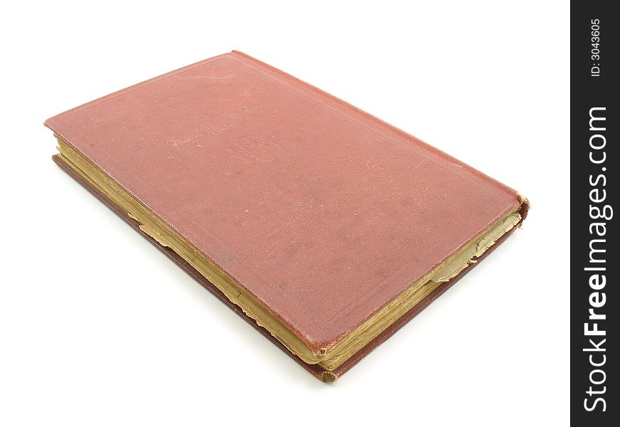 A red antique book with pages that have started to fringe on the edges and yellow. A red antique book with pages that have started to fringe on the edges and yellow.