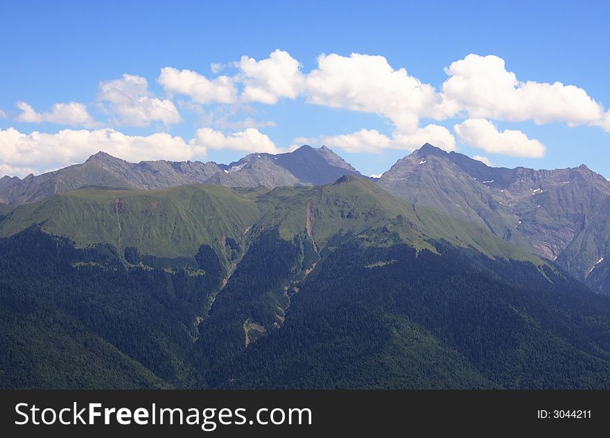 Mountain ridge of Caucasus in summer day. Mountain ridge of Caucasus in summer day