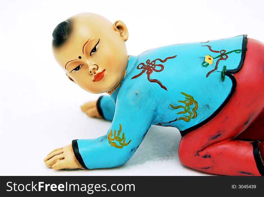 Small chinese figurine in white background. Small chinese figurine in white background