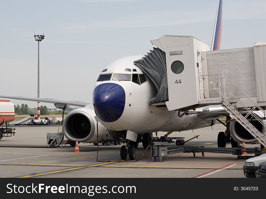 Airplane standing on the airport. Airplane standing on the airport