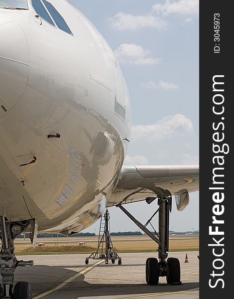 Modern airplane standing on the airport. Modern airplane standing on the airport