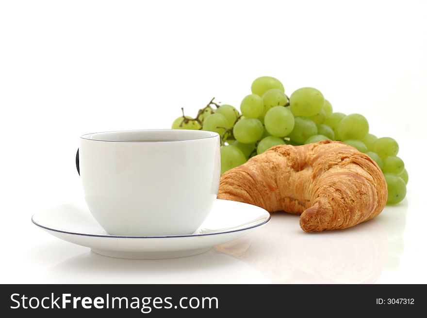 Croissant and cup of coffee. Croissant and cup of coffee