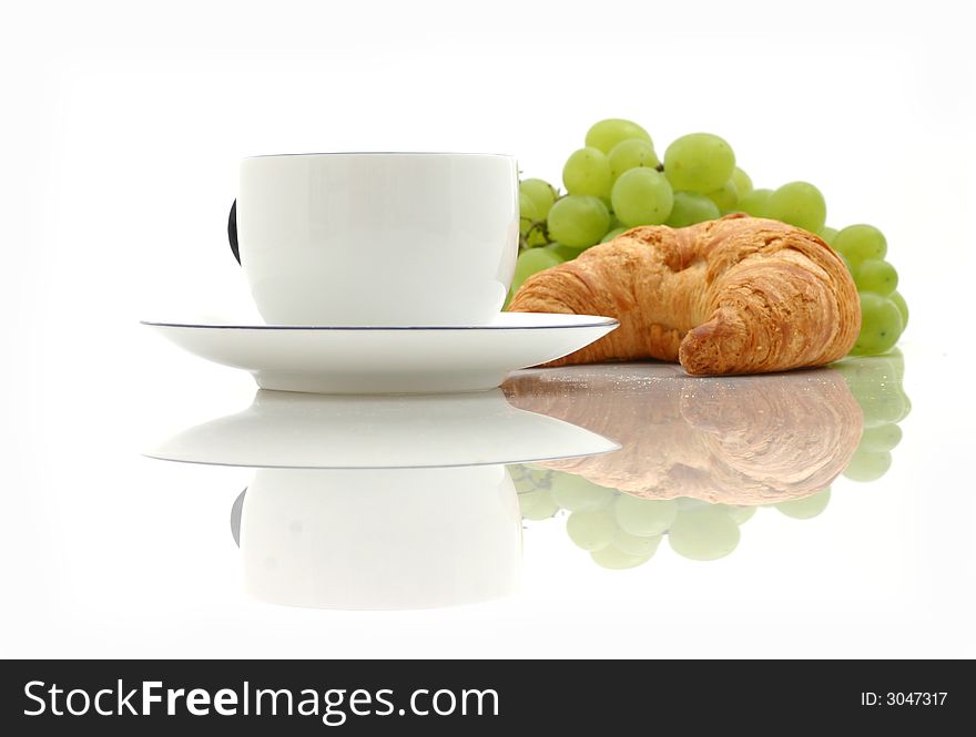 Croissant and cup of coffee. Croissant and cup of coffee