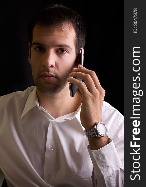 Young businessman speaking on the phone