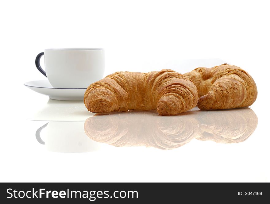 Croissant and cup of coffee. Croissant and cup of coffee