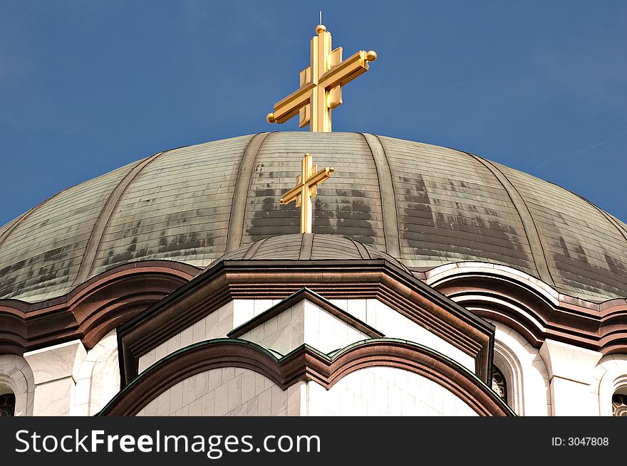 Detail of the main dome and cross of the world's largest Orthodox Temple of St. Sava in Belgrade, Serbia. Detail of the main dome and cross of the world's largest Orthodox Temple of St. Sava in Belgrade, Serbia