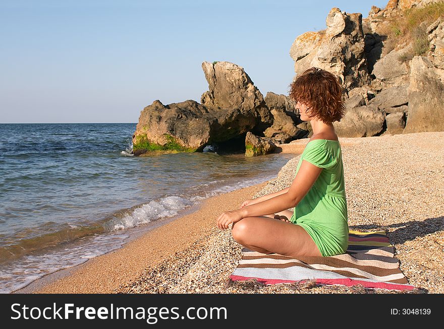 Yoga practise on the beach