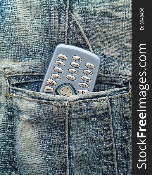 Telephone in the pocket of jeans. Telephone in the pocket of jeans
