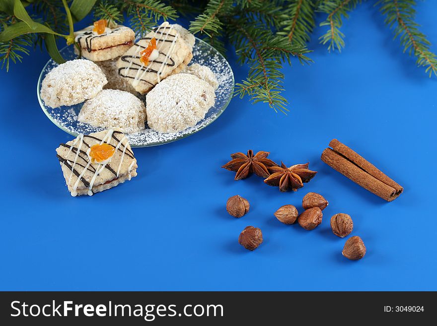 Christmas cookies with spice on the blue background