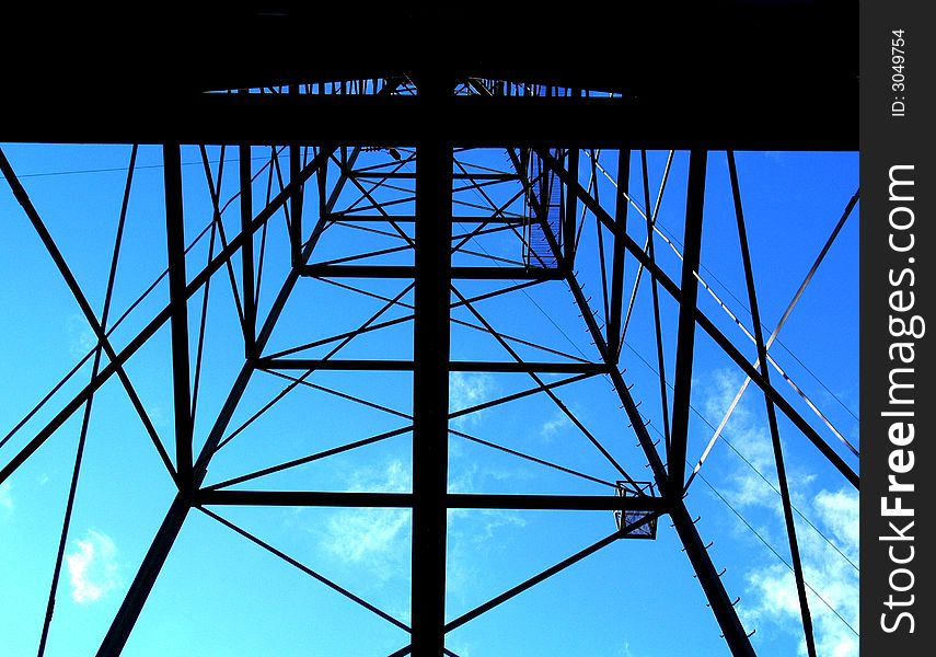 Shot of a power tower from looking up position. Shot of a power tower from looking up position
