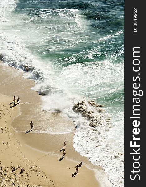 Bathers contemplating the heavy sea, Portugal. Bathers contemplating the heavy sea, Portugal