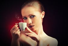 Sexy Woman Enjoying A Hot Cup Of Coffee On A Dark Background Stock Image Sexy Woman Enjoying A Hot Cup Of Coffee On A Dark Background Stock Image