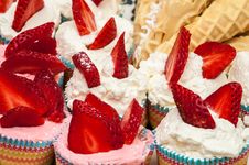 Delicious Vanilla Cupcake With Strawberry Frosting And Fresh Str Royalty Free Stock Image