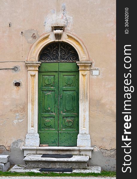 Italian frontdoor in an Italian village. Italian frontdoor in an Italian village.