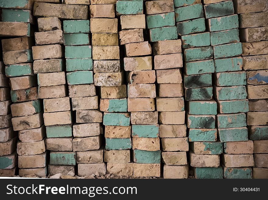 Stack of bricks painted in blue color, as background. Stack of bricks painted in blue color, as background.