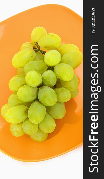 Bunch of grapes on a light background (details)