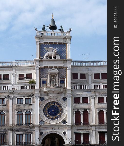 Venice - a view of the Clock Tower (Torre dell'Orologio) at the St. Mark Piazza. Venice - a view of the Clock Tower (Torre dell'Orologio) at the St. Mark Piazza